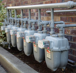 Row of gas meters with full manifolding