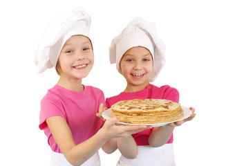 Happy little girls with pancakes