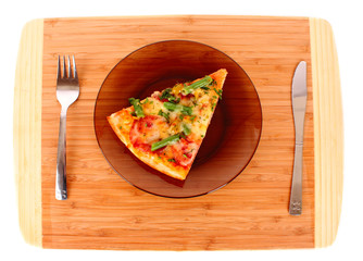 Pizza on plate with fork and knife