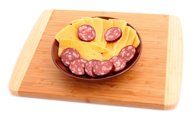 Sausage and cheese in smile form on plate