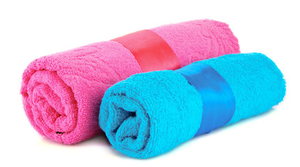 Twisted blue and pink towels with bands isolated on white