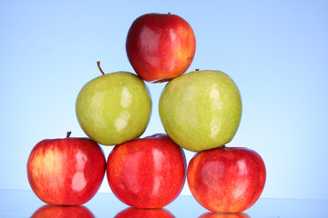 Apples on blue background