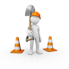 Construction worker with a shovel and traffic cones