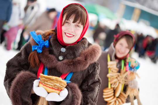 girls   with pancake during  Shrovetide