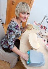 woman in manicure salon