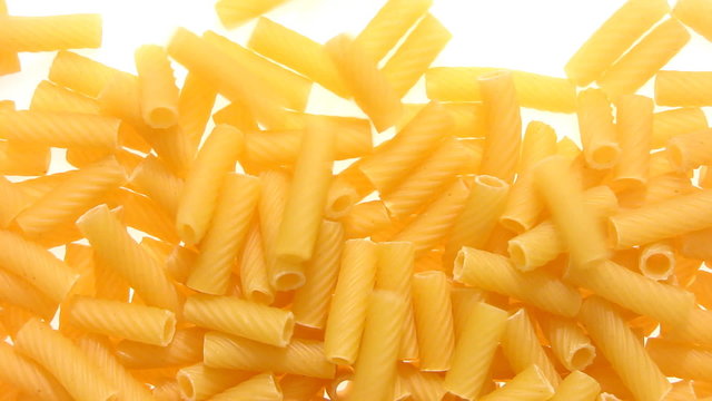 Macaronis on white background.