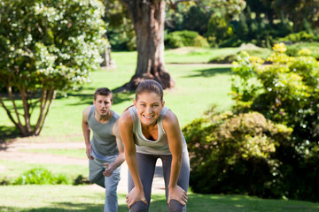 Fototapeta premium Sporty lovers in the park