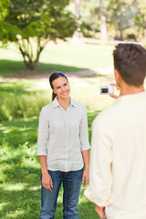 Fototapeta premium Man taking a photo of his girlfriend
