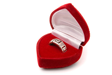 Classic silver ring in red box isolated on a white