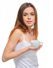 Young happy mixed race woman holding a coffee cup isolated on wh