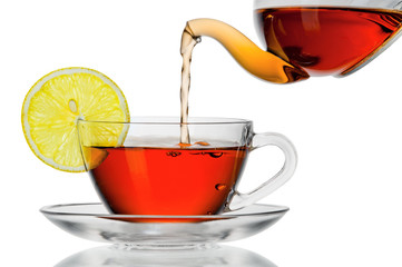 Tea being poured into glass tea