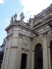 Statue at In front of and left Versaille Castle