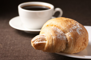Croissant and black coffee