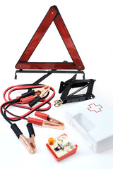 Emergency kit for car - first aid kit, jumper cables, triangle,