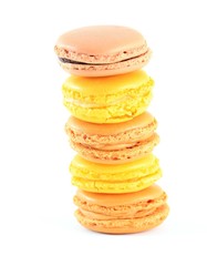 Pile of traditional french macarons, isolated on white