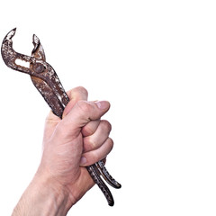 Hand with rusty old pipe wrench, isolated