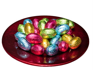 Easter eggs in red bowl - isolated