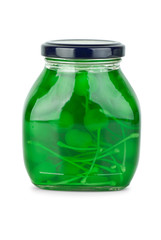Glass jar with green cocktail cherries