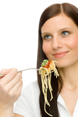 Italian food - healthy woman eat spaghetti sauce