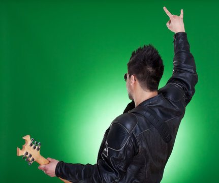 back of a heavy metal guitarist