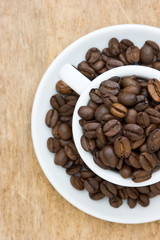 Cup with coffee beans