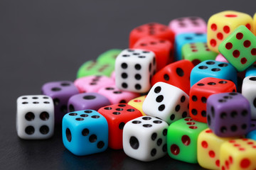 Bright playing bones lie on tabletop