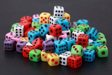 Playing varicoloured bones lie on  heap