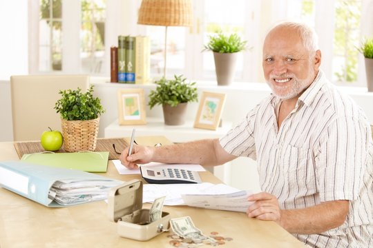 Active pensioner working at home