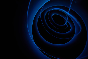 Abstract colorful spiral on black background