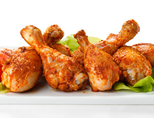 Roasted chicken drumsticks and vegetables