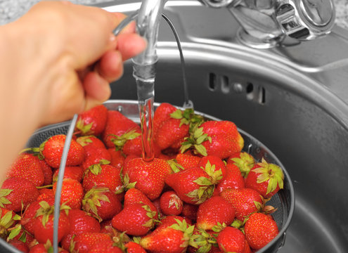 strawberry under current water