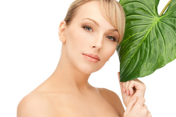 woman with green leaf