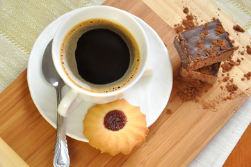 Morning coffee with biscuits and cake