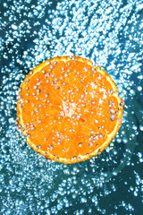 Orange in water splash