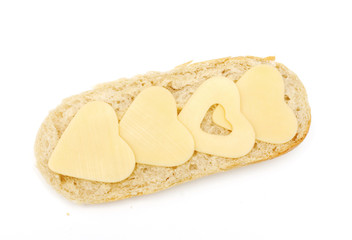 heart-shaped pieces of cheese on wheat bread