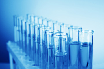 Test-tubes on blue background