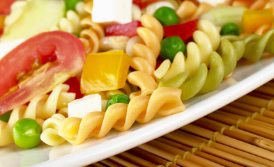 Pasta salad with fresh vegetables and cheese