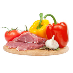 raw meat with peppers, tomatoes and garlic ingredients