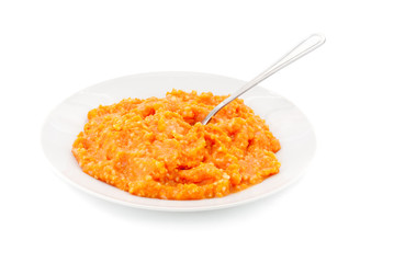porridge pumpkin and wooden spoon