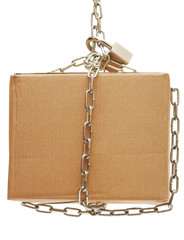 cardboard box closed with a chain and a lock