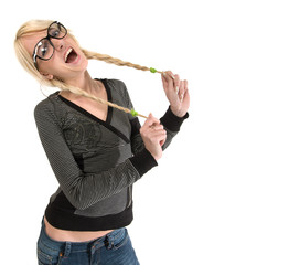 Pretty young woman with glasses looks like as nerdy girl, humor