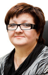 Beautiful businesswoman with glasses on a white background and t