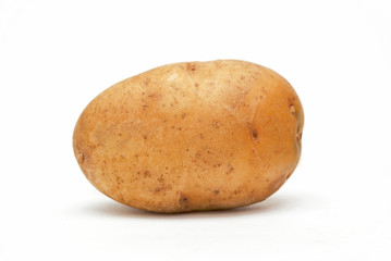 Single large potato isolated against a white background