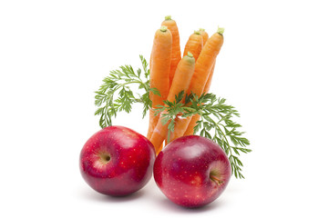 two apples and fresh carrots