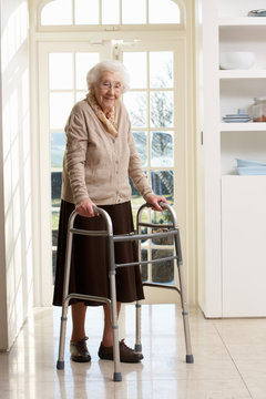Elderly Senior Woman Using Walking Frame