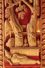 Fototapeta premium Buddhist carving on door of temple