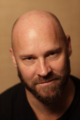 Fototapeta premium Handsome bald man with a beard