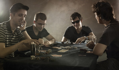 4 guys playing poker - 30866768