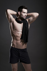 Fototapeta na wymiar Closeup of a muscular handsome man in underwear