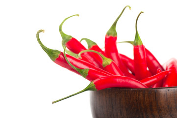 Hot pepper in a wooden bowl
